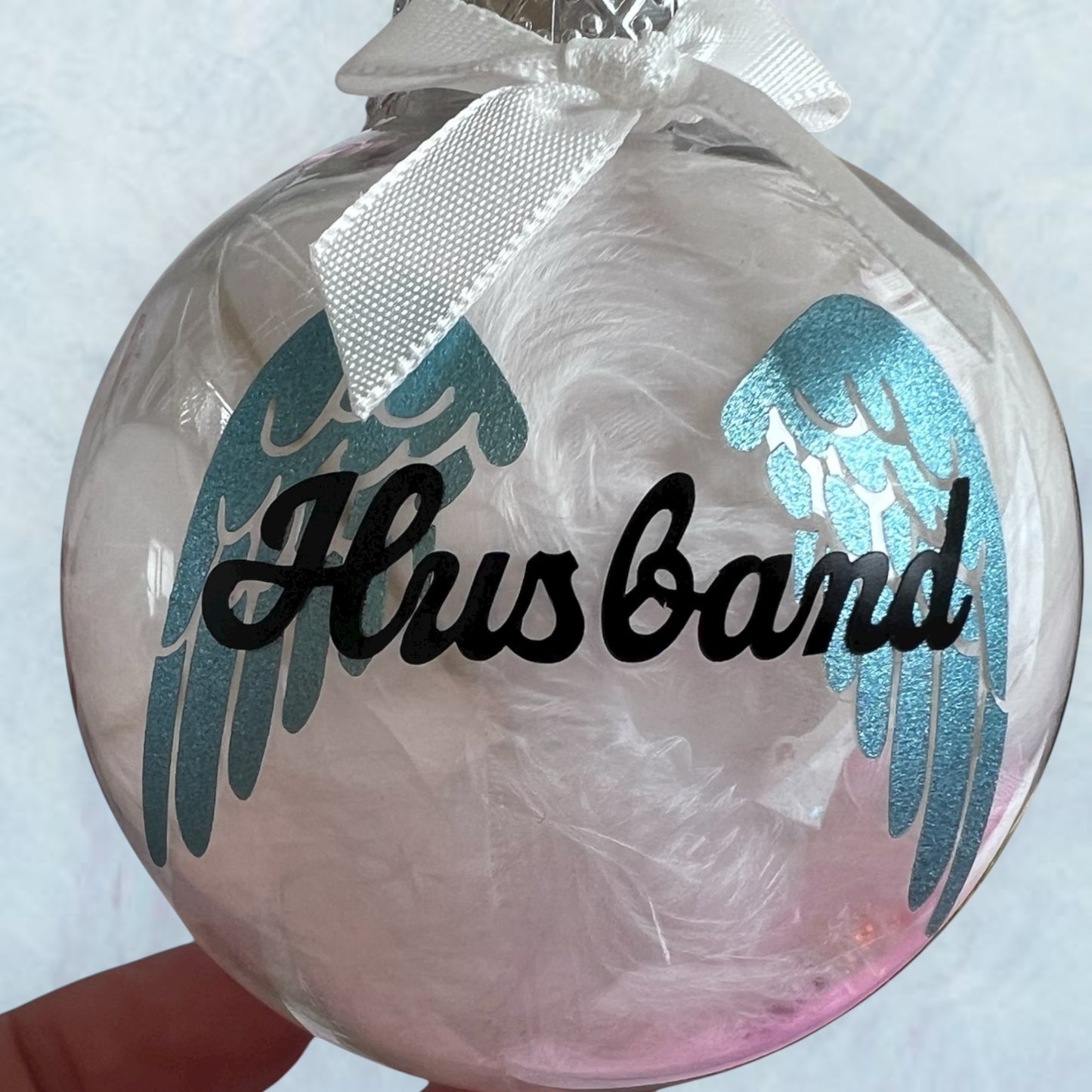 Personalised feather filled memorial baubles
