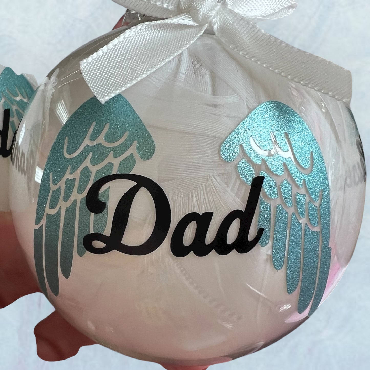 Personalised feather filled memorial baubles